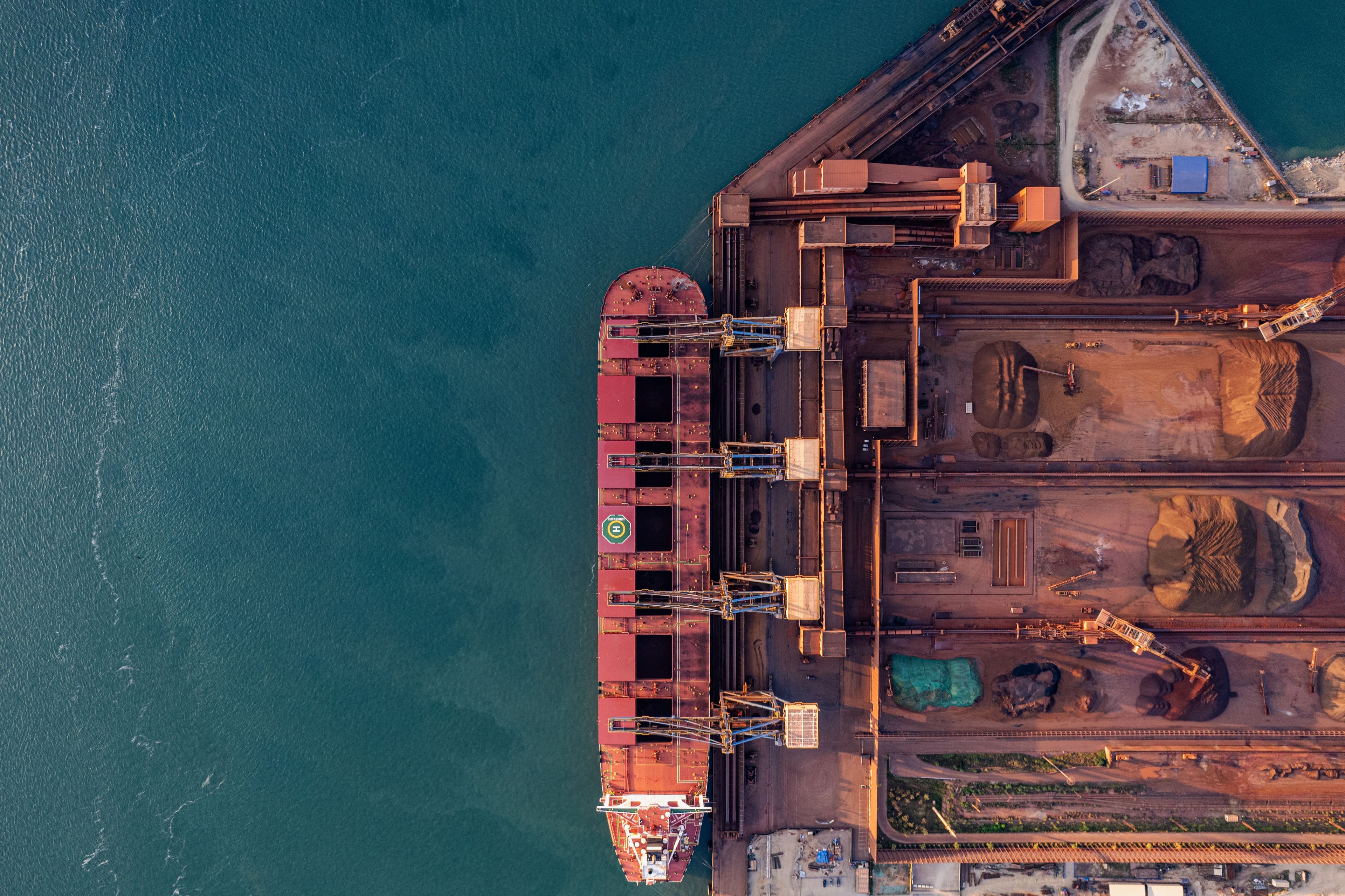 A bulk carrier loading at a dry bulk terminal