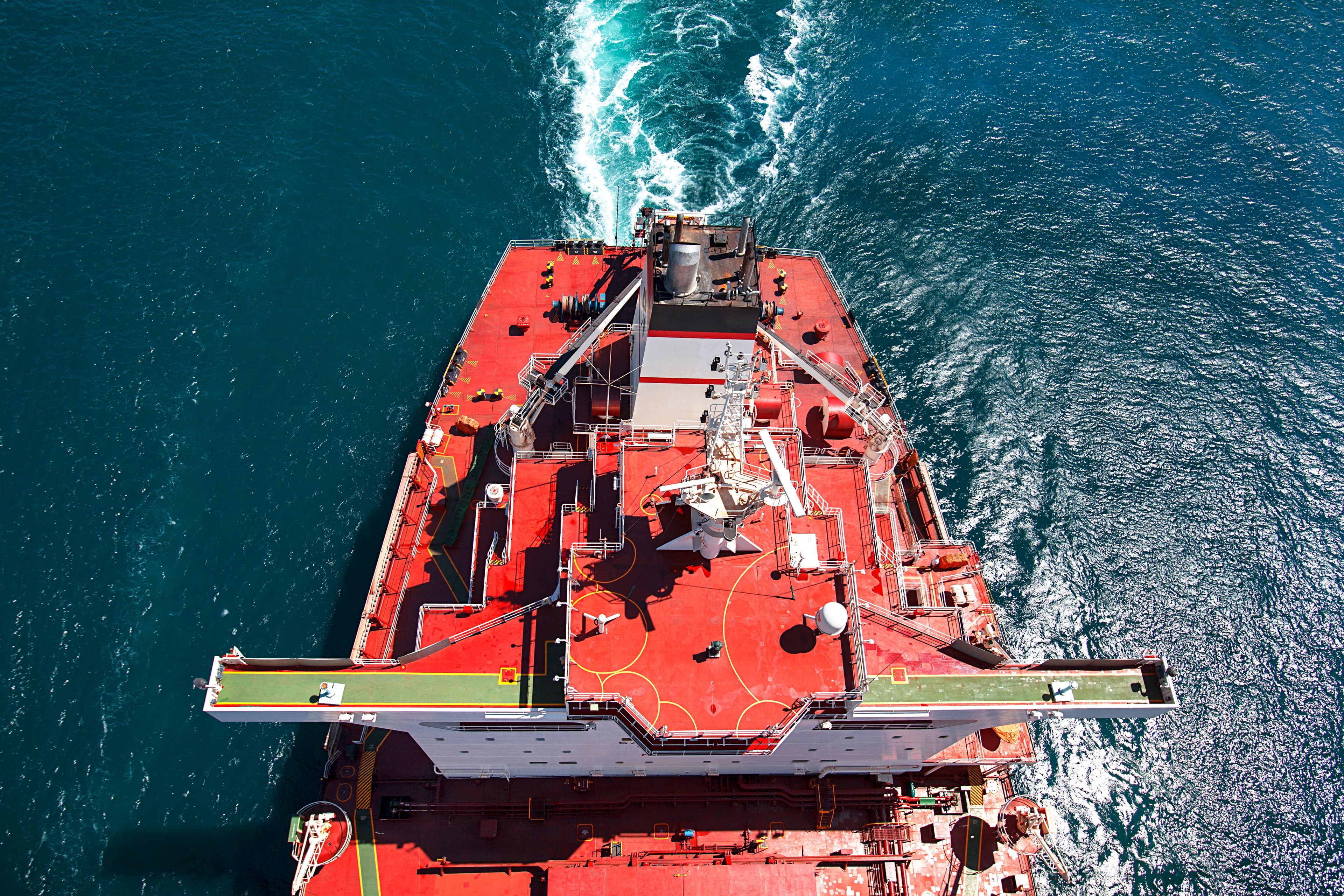 A bulk carrier under way, stern aerial view